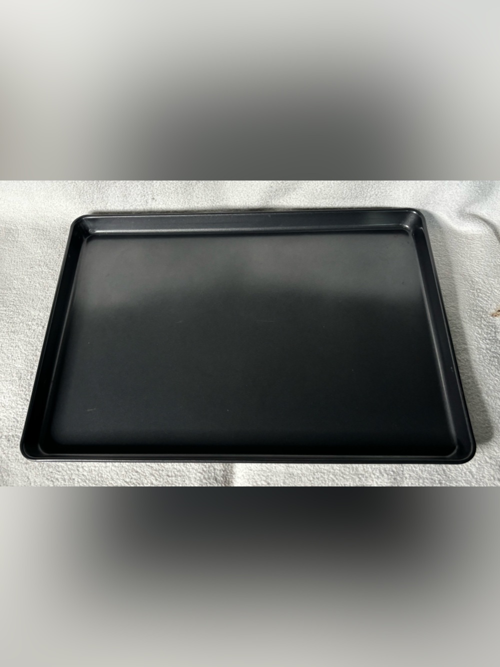 Black nonstick baking sheet cookies pan rectangular metal oven bakeware.